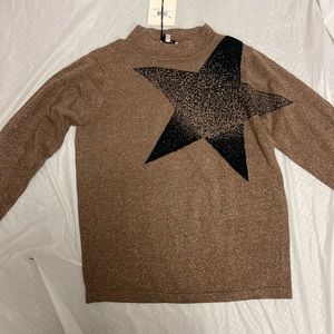 Sparkle sweater with a star on it